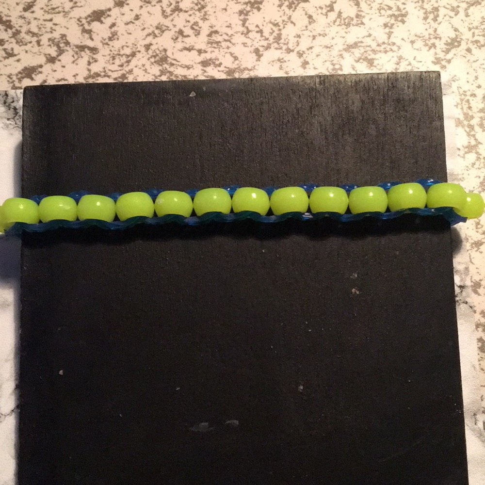 Blue band with yellow bead